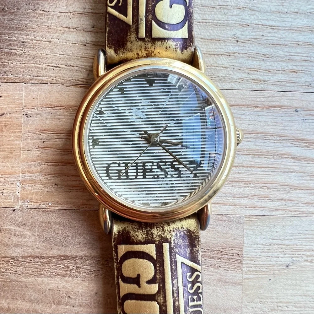 Vintage Guess ladies gold tone logo leather dress Watch NEW BATTERY